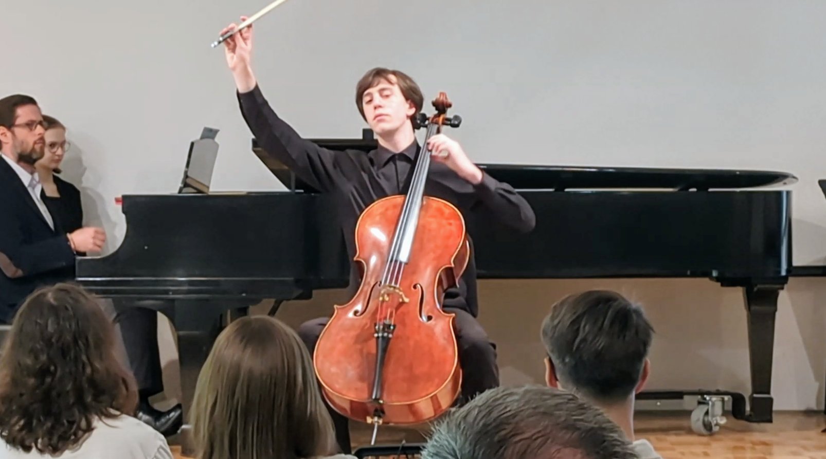 Elliot playing solo cello in Senior Recital